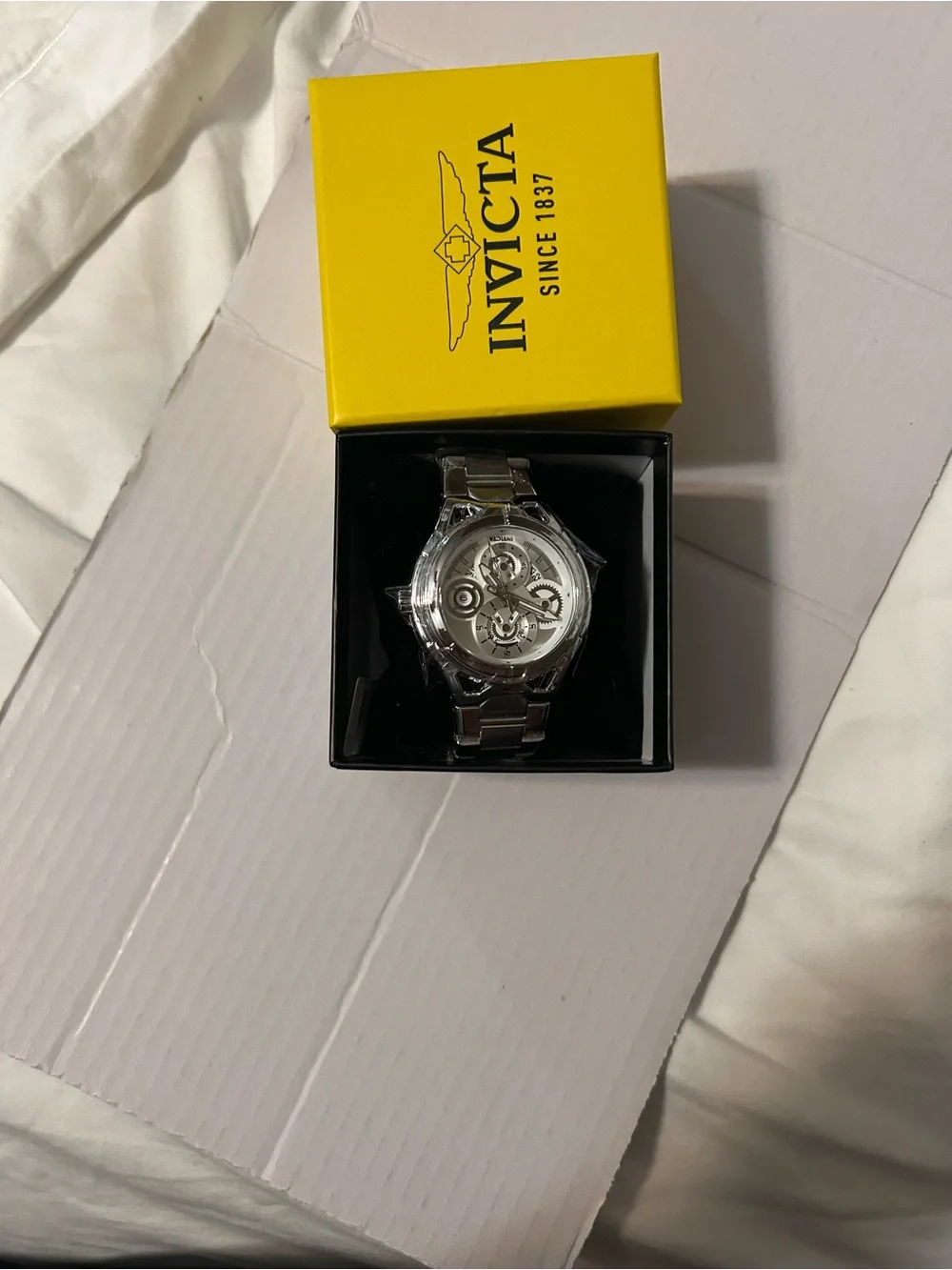 Invicta Silver Stainless Steel Skeleton Dial Watch with Yellow Box